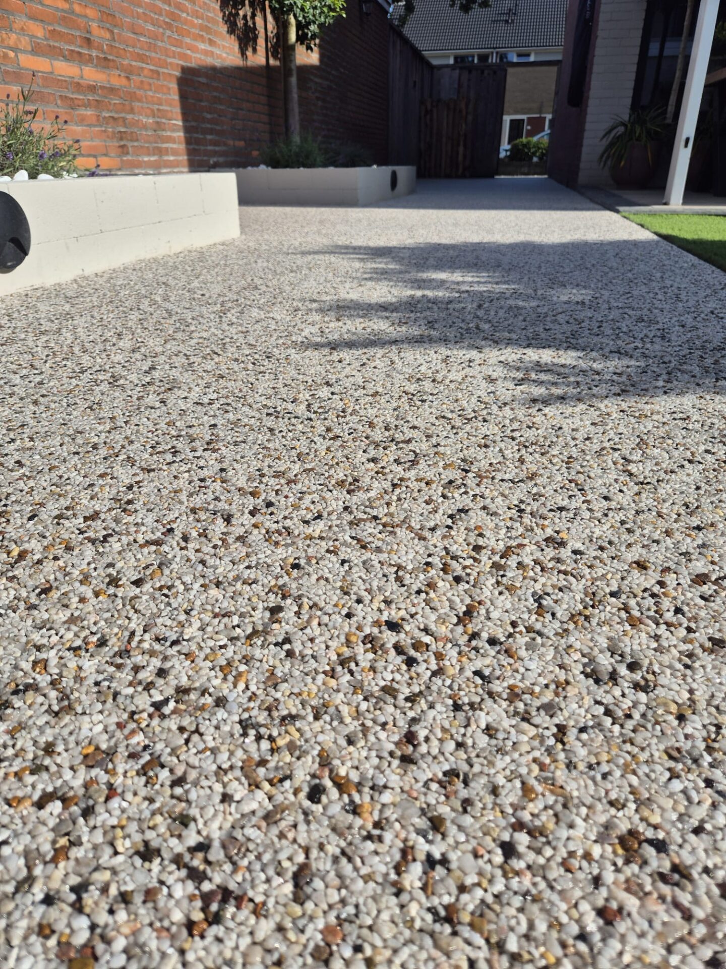 Naadloos harsgebonden grind pad, project Step Stones